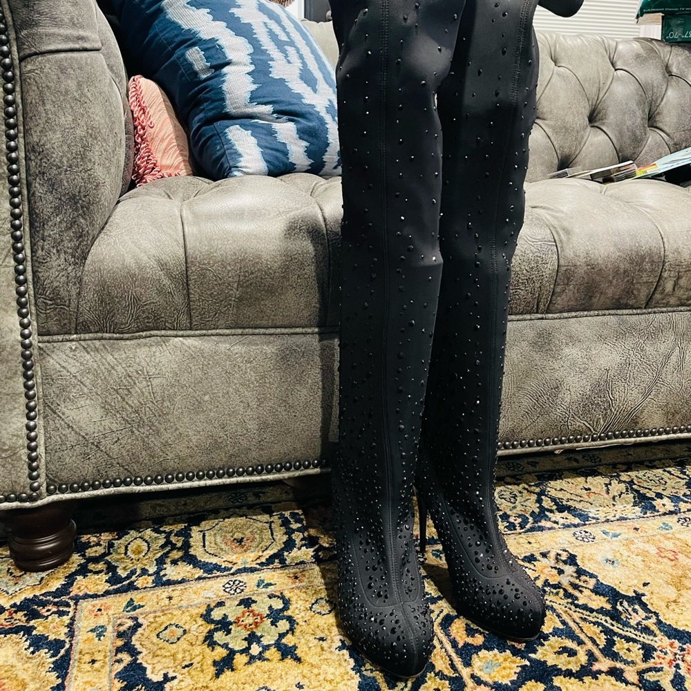 Black sequined thigh high boots